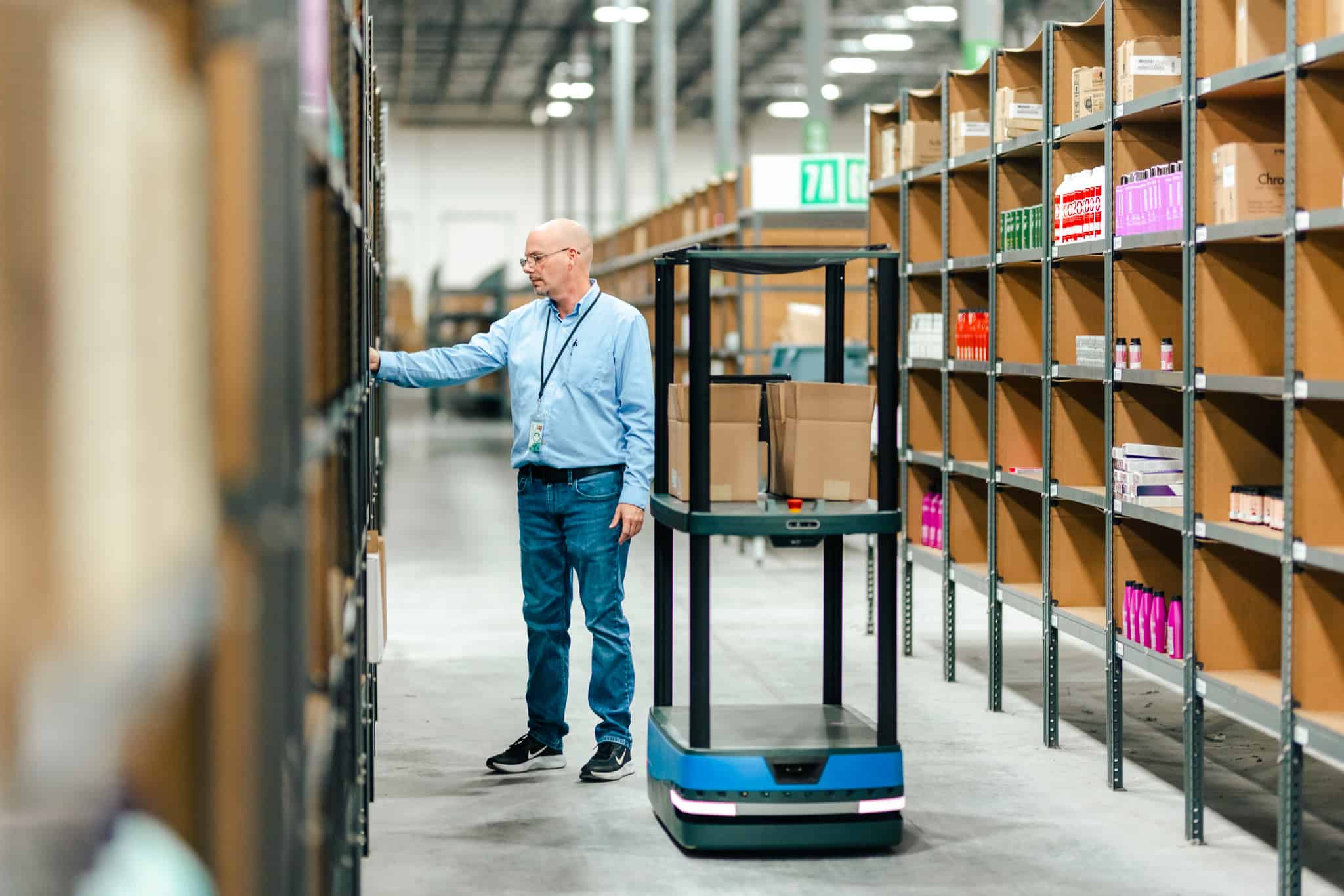 An associate picks an order during peak warehouse fulfillment